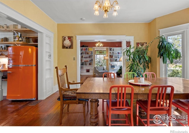838 University Ave, Boulder, CO 80302 - dining room with an inviting chandelier and wood finished floors