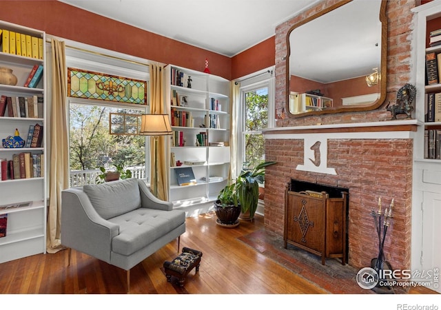 838 University Ave, Boulder, CO 80302 - living area featuring wood-type flooring and a fireplace