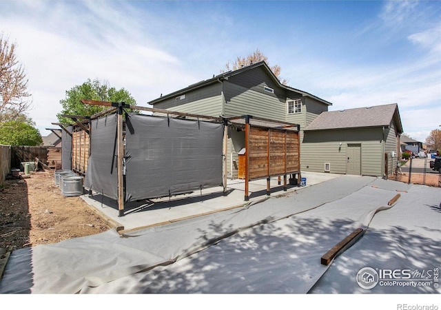 view of front of home with fence