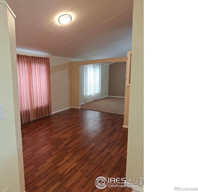 4202 Coronado St, Greeley, CO 80634 - unfurnished room with baseboards and dark wood-style flooring