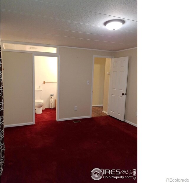 4202 Coronado St, Greeley, CO 80634 - unfurnished bedroom with baseboards, carpet, and ensuite bathroom