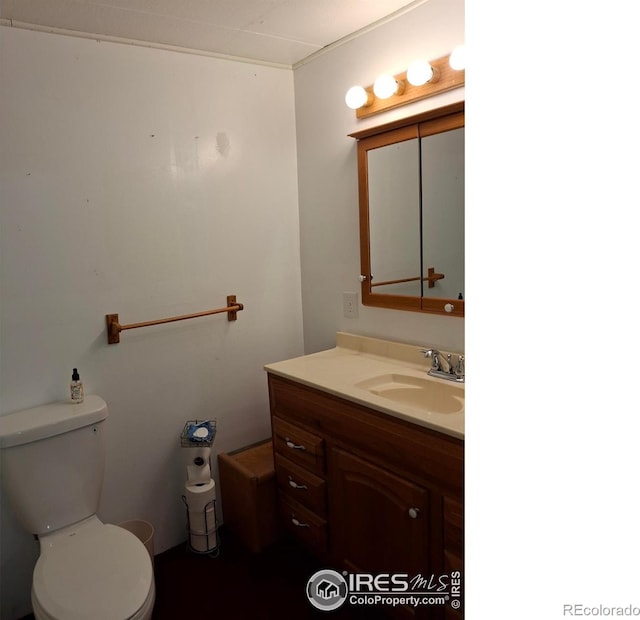4202 Coronado St, Greeley, CO 80634 - half bath featuring vanity and toilet