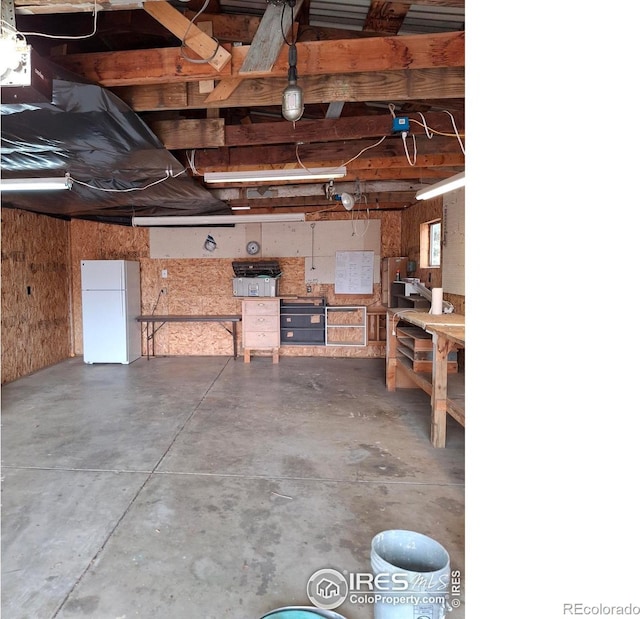 4202 Coronado St, Greeley, CO 80634 - garage featuring freestanding refrigerator
