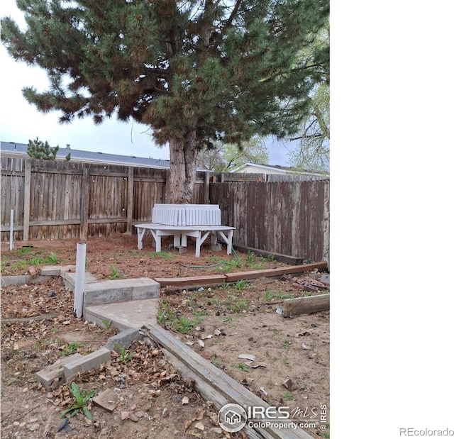 4202 Coronado St, Greeley, CO 80634 - view of yard with fence and a vegetable garden
