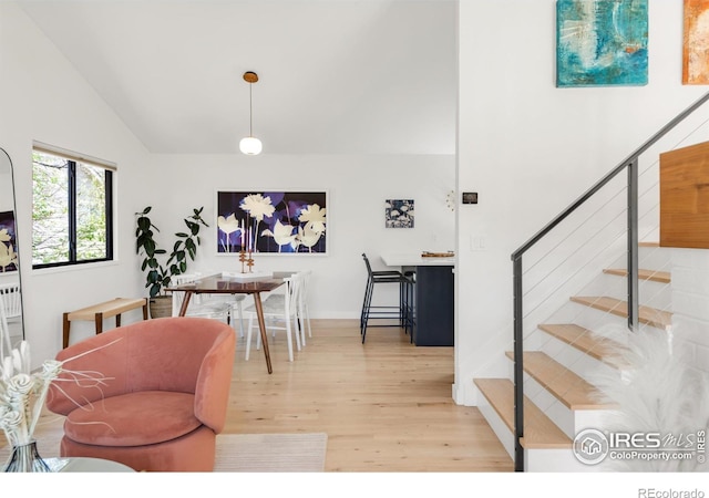 3809 Howe Ct, Boulder, CO 80301 - interior space featuring high vaulted ceiling, wood finished floors, and stairway