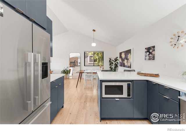 3809 Howe Ct, Boulder, CO 80301 - kitchen featuring light countertops, stainless steel appliances, light wood-style flooring, and a peninsula