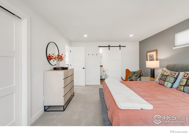 3809 Howe Ct, Boulder, CO 80301 - bedroom with recessed lighting, baseboards, light colored carpet, and a barn door