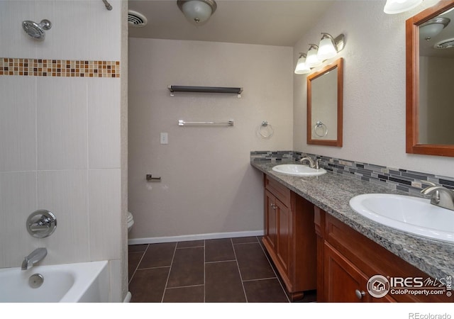 2605 Crabapple Ct, Golden, CO 80401 - full bath featuring visible vents, a sink, tile patterned flooring, and double vanity