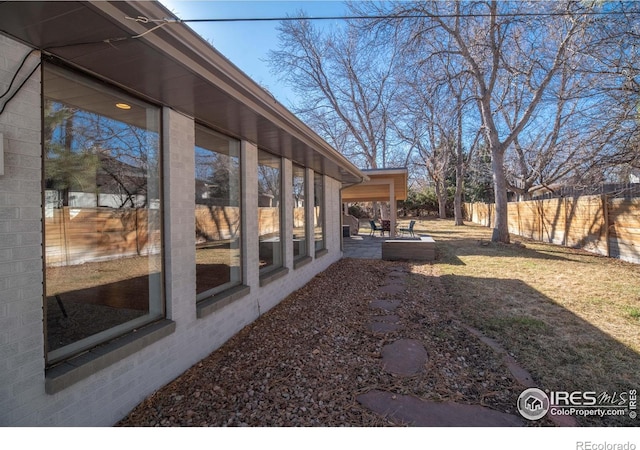 2605 Crabapple Ct, Golden, CO 80401 - view of yard with fence and a patio area