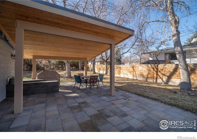 2605 Crabapple Ct, Golden, CO 80401 - view of patio / terrace with outdoor dining area and a fenced backyard