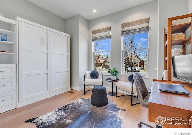 2890 Curtis St, Denver, CO 80205 - office with light wood-style flooring, recessed lighting, and baseboards