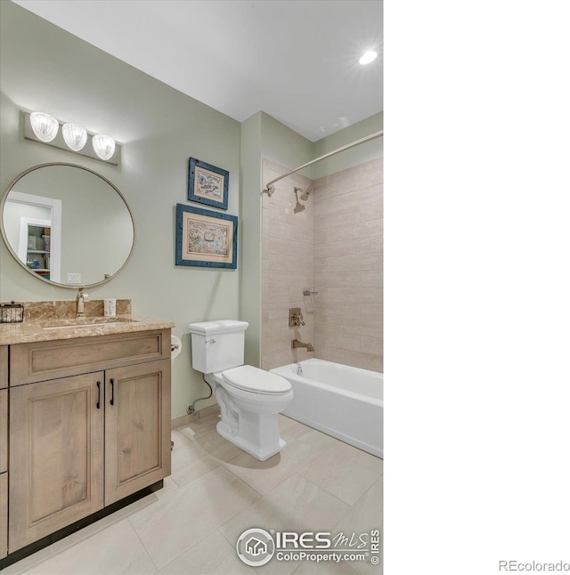2890 Curtis St, Denver, CO 80205 - bathroom with toilet, baseboards, vanity, tile patterned flooring, and  shower combination