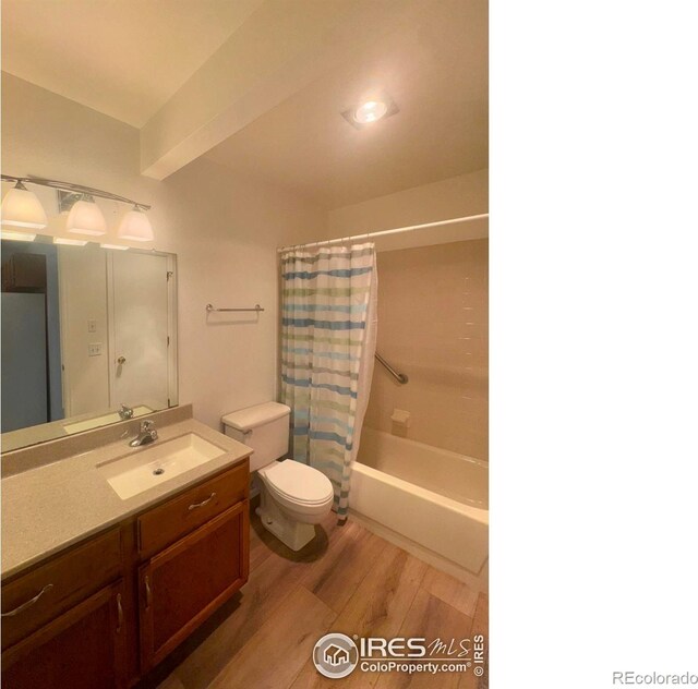 3565 Windmill Dr Unit 3, Fort Collins, CO 80526 - bathroom with wood finished floors, vanity, toilet, and shower / tub combo