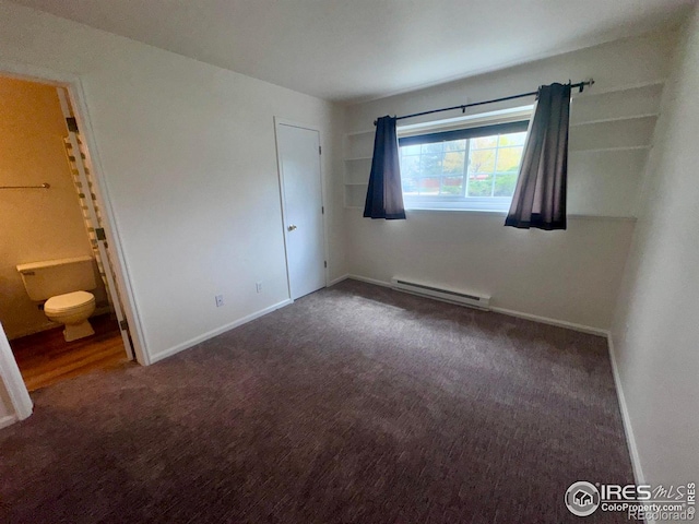 3565 Windmill Dr Unit 3, Fort Collins, CO 80526 - unfurnished bedroom featuring a baseboard radiator, carpet floors, ensuite bathroom, and baseboards