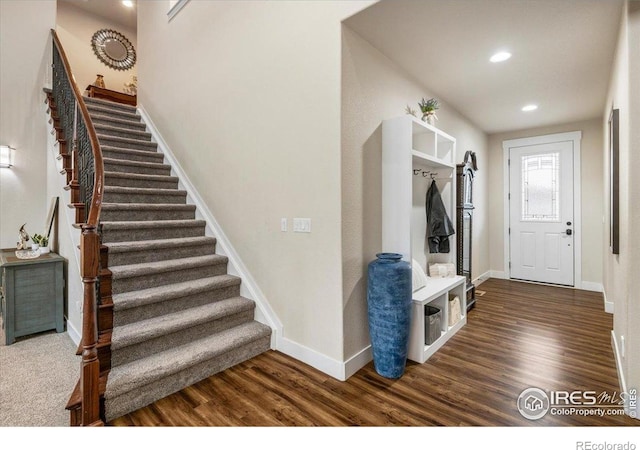 mudroom featuring baseboards, recessed lighting, and wood finished floors