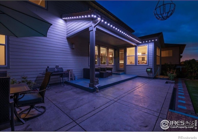 view of patio at night