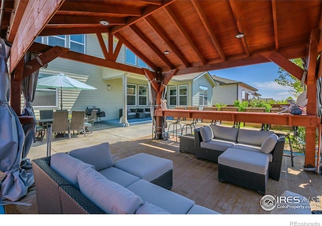 view of patio / terrace with outdoor lounge area and outdoor dining area