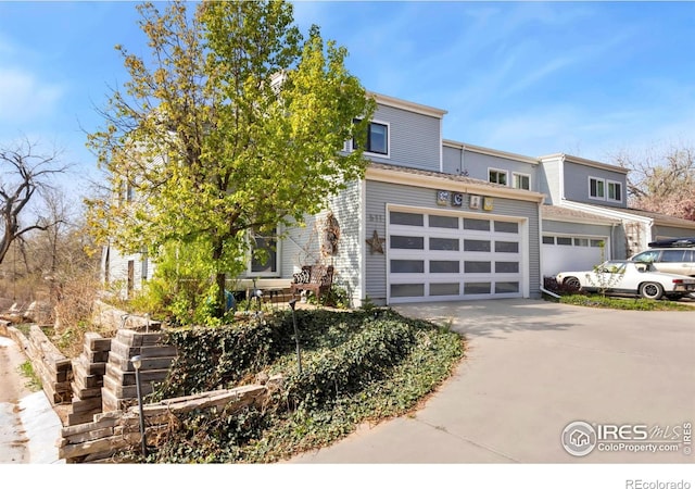 511 Spindrift Ct, Fort Collins, CO 80525 - view of front of home with an attached garage and driveway