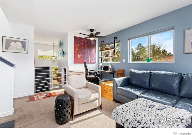511 Spindrift Ct, Fort Collins, CO 80525 - carpeted living area featuring a ceiling fan and baseboards