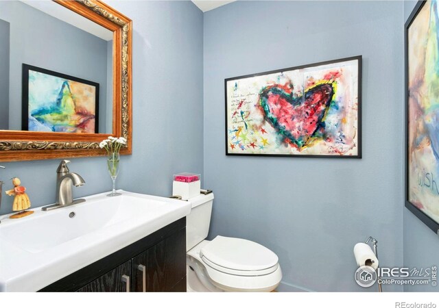 511 Spindrift Ct, Fort Collins, CO 80525 - bathroom featuring vanity and toilet