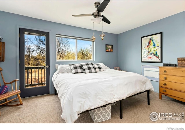 511 Spindrift Ct, Fort Collins, CO 80525 - bedroom with carpet floors, ceiling fan, and access to exterior