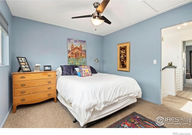 511 Spindrift Ct, Fort Collins, CO 80525 - bedroom with a ceiling fan, baseboards, and light carpet