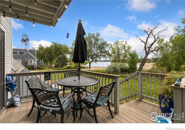 511 Spindrift Ct, Fort Collins, CO 80525 - deck featuring outdoor dining area and a yard