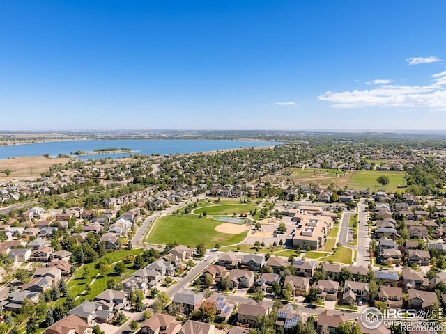 aerial view with a water view and a residential view