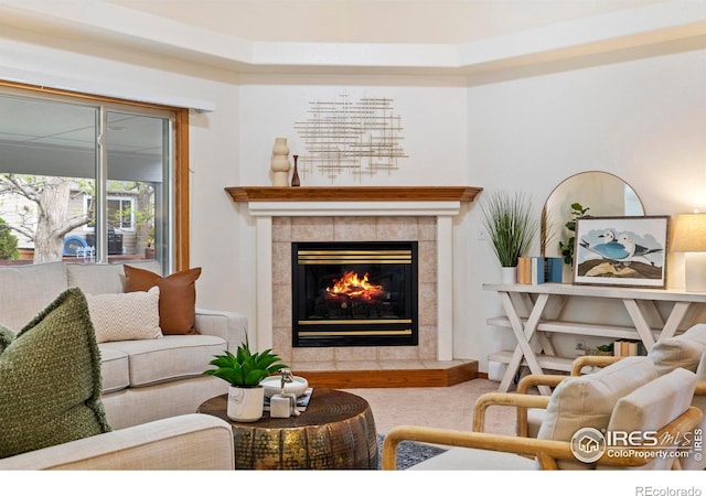 2476 Forsythia Dr, Loveland, CO 80537 - living room with carpet floors and a fireplace