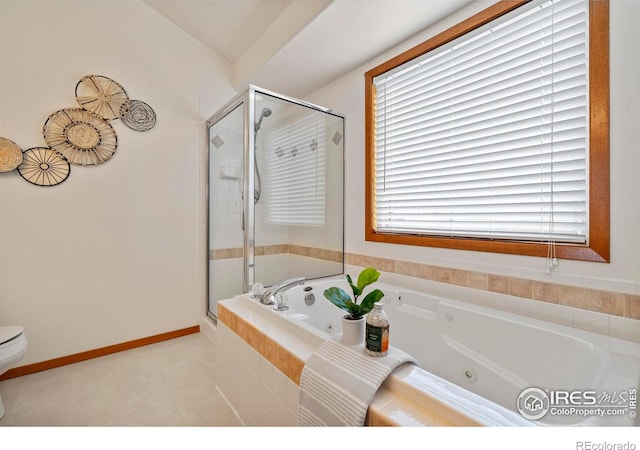 2476 Forsythia Dr, Loveland, CO 80537 - full bathroom with a whirlpool tub, tile patterned floors, toilet, and a shower stall