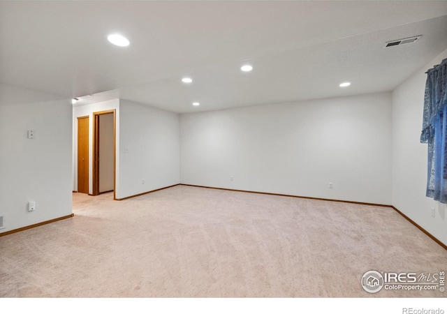 2476 Forsythia Dr, Loveland, CO 80537 - spare room featuring recessed lighting, baseboards, and light colored carpet