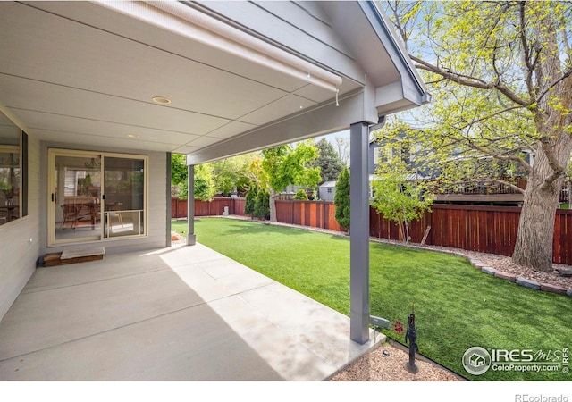 2476 Forsythia Dr, Loveland, CO 80537 - view of patio / terrace featuring a fenced backyard