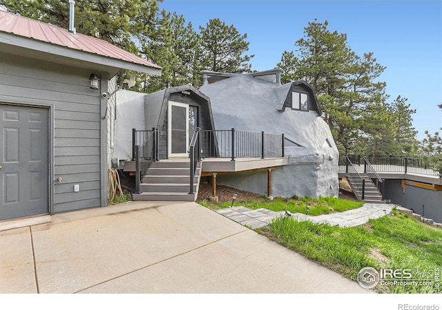 387 Millionaire Dr E, Boulder, CO 80302 - view of front of property featuring stairs and a deck