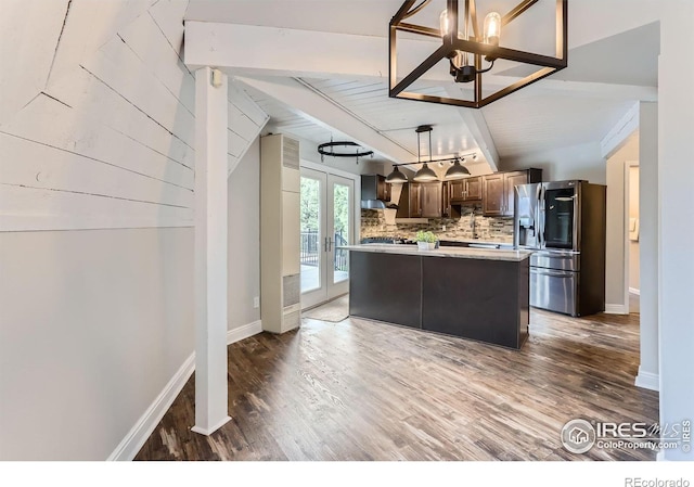 387 Millionaire Dr E, Boulder, CO 80302 - kitchen featuring stainless steel refrigerator with ice dispenser, light countertops, a chandelier, wood finished floors, and backsplash
