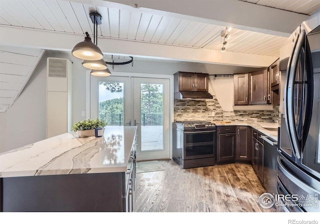 387 Millionaire Dr E, Boulder, CO 80302 - kitchen featuring appliances with stainless steel finishes, light wood-style flooring, beamed ceiling, wood ceiling, and dark brown cabinets