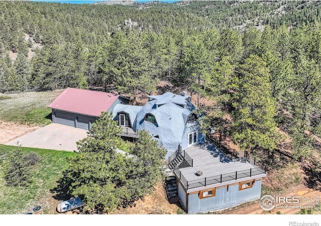 387 Millionaire Dr E, Boulder, CO 80302 - view from above of property with a heavily wooded area