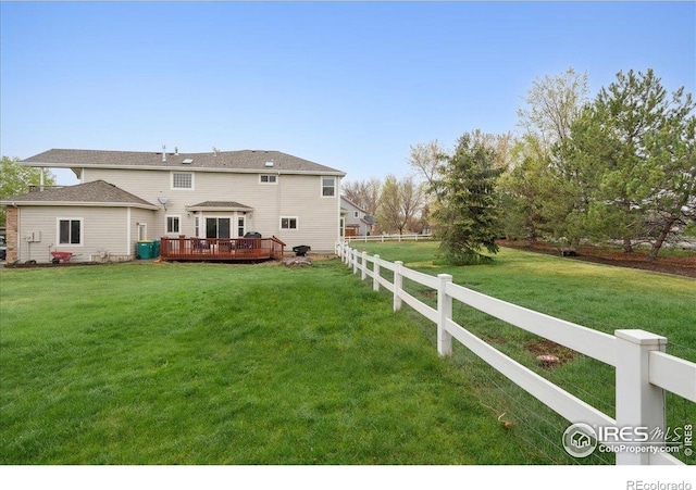 8355 Louden Circle Ft, Collins, CO 80528 - rear view of house with a lawn, fence, and a wooden deck