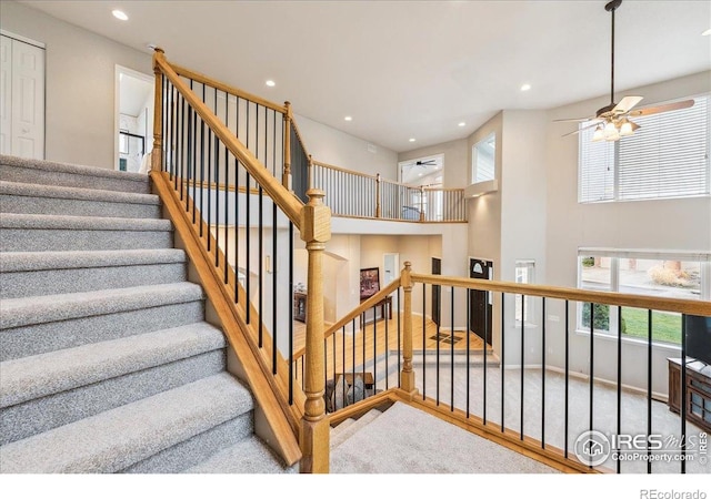 8355 Louden Circle Ft, Collins, CO 80528 - staircase featuring recessed lighting, ceiling fan, and a wealth of natural light