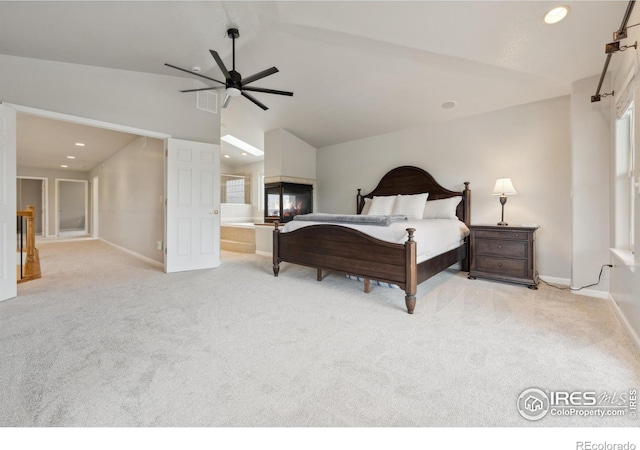 8355 Louden Circle Ft, Collins, CO 80528 - bedroom with baseboards, light carpet, vaulted ceiling, and recessed lighting