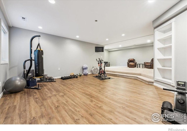 8355 Louden Circle Ft, Collins, CO 80528 - workout area with baseboards, recessed lighting, wood finished floors, and visible vents