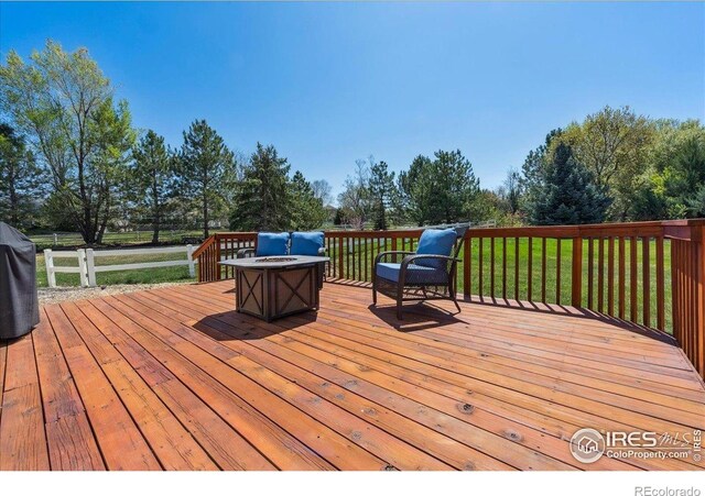 8355 Louden Circle Ft, Collins, CO 80528 - wooden deck featuring a lawn