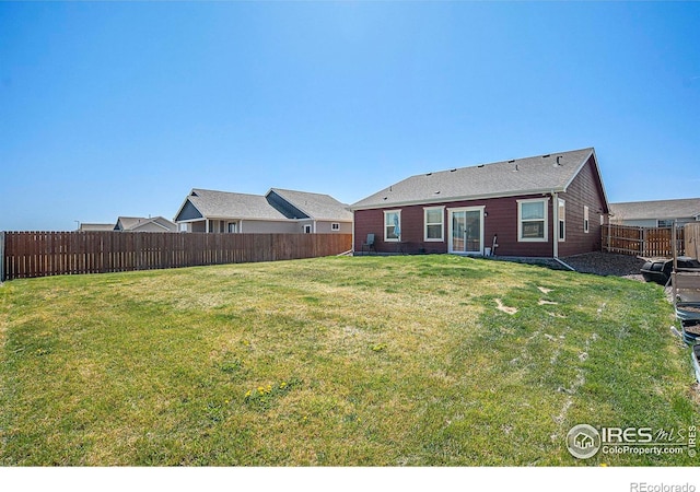 403 11th Ave, Wiggins, CO 80654 - exterior space with a fenced backyard