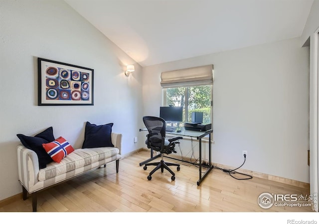 912 Sailors Reef Ft, Collins, CO 80525 - home office featuring vaulted ceiling, wood finished floors, and baseboards