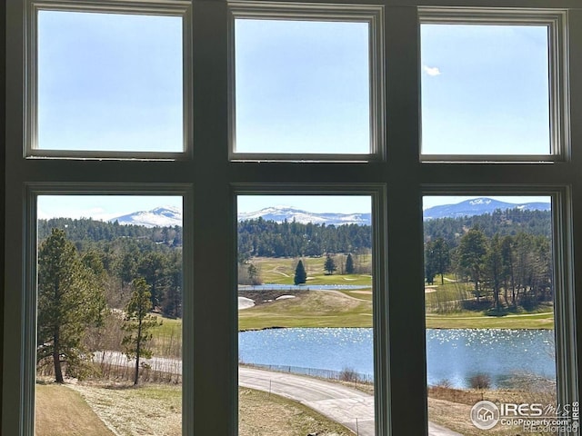 doorway with a water and mountain view