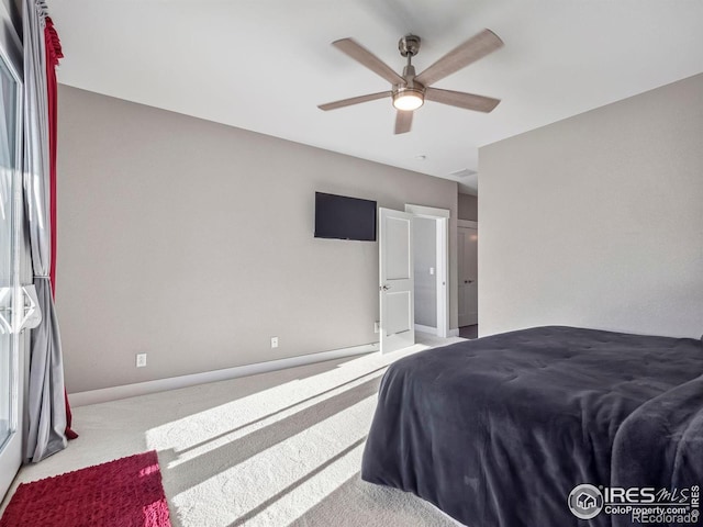 bedroom featuring baseboards, carpet, and ceiling fan