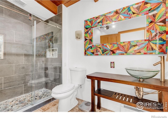 2345 Point Of Pines Dr, Boulder, CO 80302 - bathroom featuring toilet, visible vents, a shower stall, and a sink