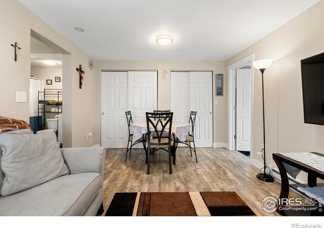 316 14th Ave, Greeley, CO 80631 - dining space with baseboards and light wood-style flooring
