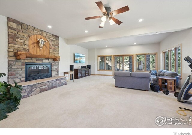 27921 Alabraska Ln, Evergreen, CO 80439 - living room featuring carpet flooring, a fireplace, recessed lighting, and ceiling fan