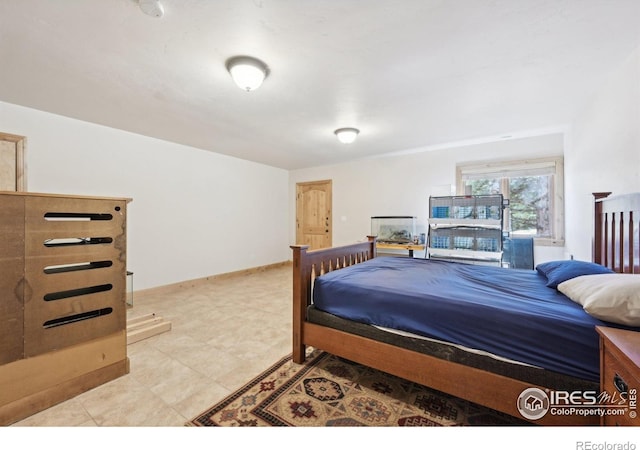 27921 Alabraska Ln, Evergreen, CO 80439 - bedroom with baseboards