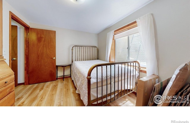 729 Jay Pl, Berthoud, CO 80513 - bedroom featuring wood finished floors